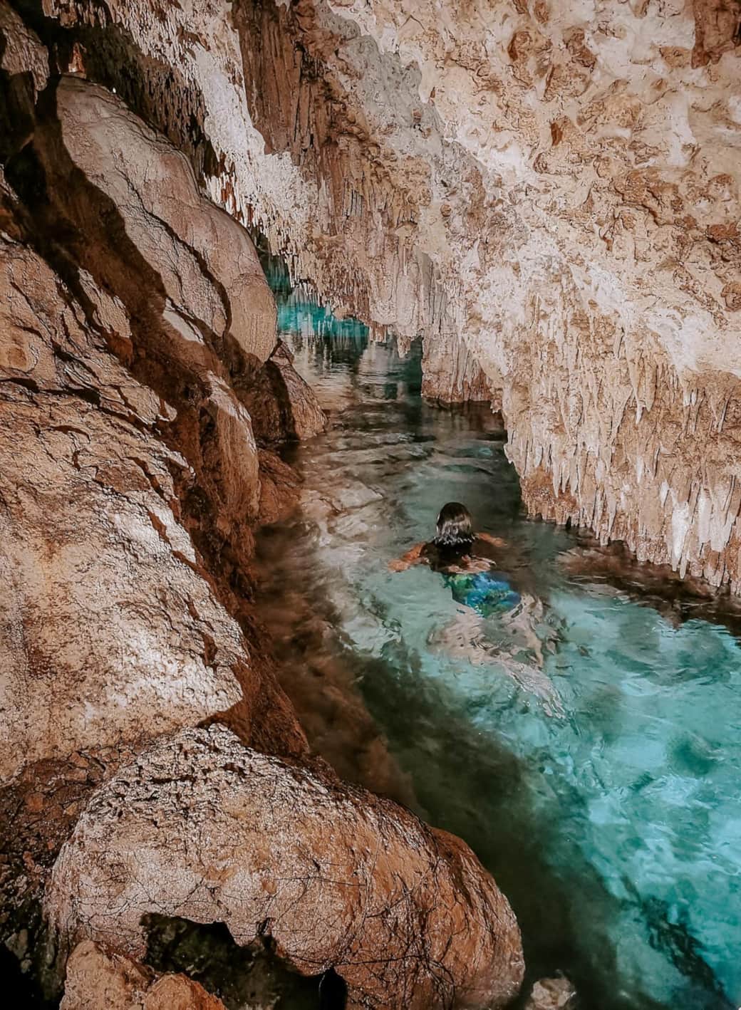 Take a dip in the clear blue waters of the cenote