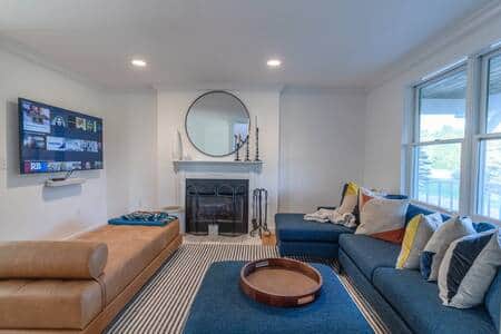 Main level living room with a smart TV featuring Sonos sound system.