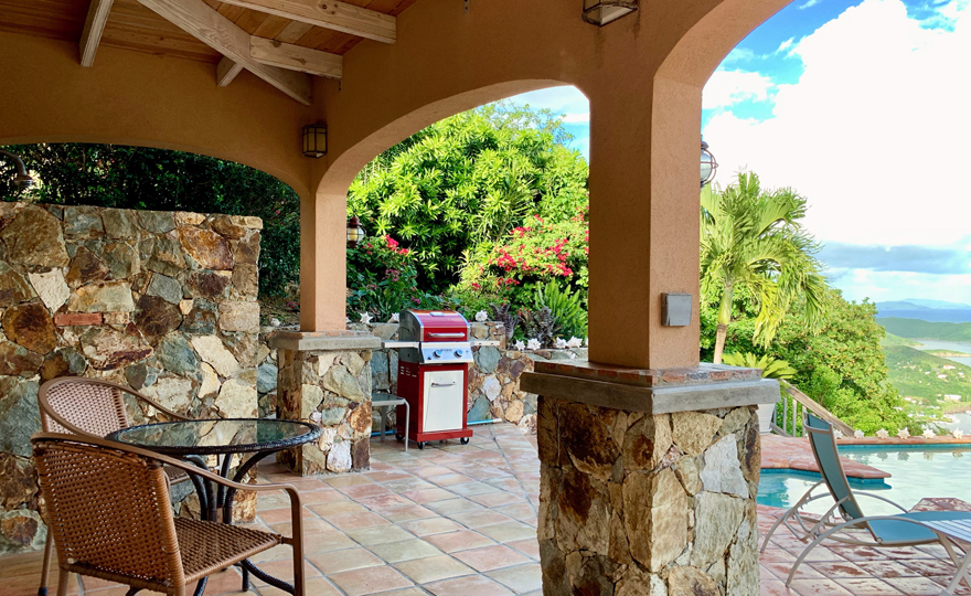Covered veranda, outdoor shower, and grill deck