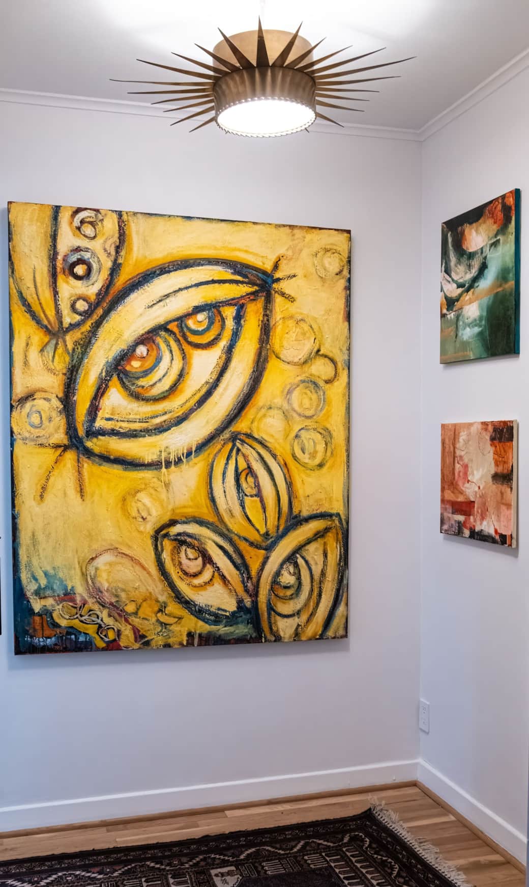 Be greeted by the work of M. Oliver-Foster & Denise Aguilar when you step into the home.