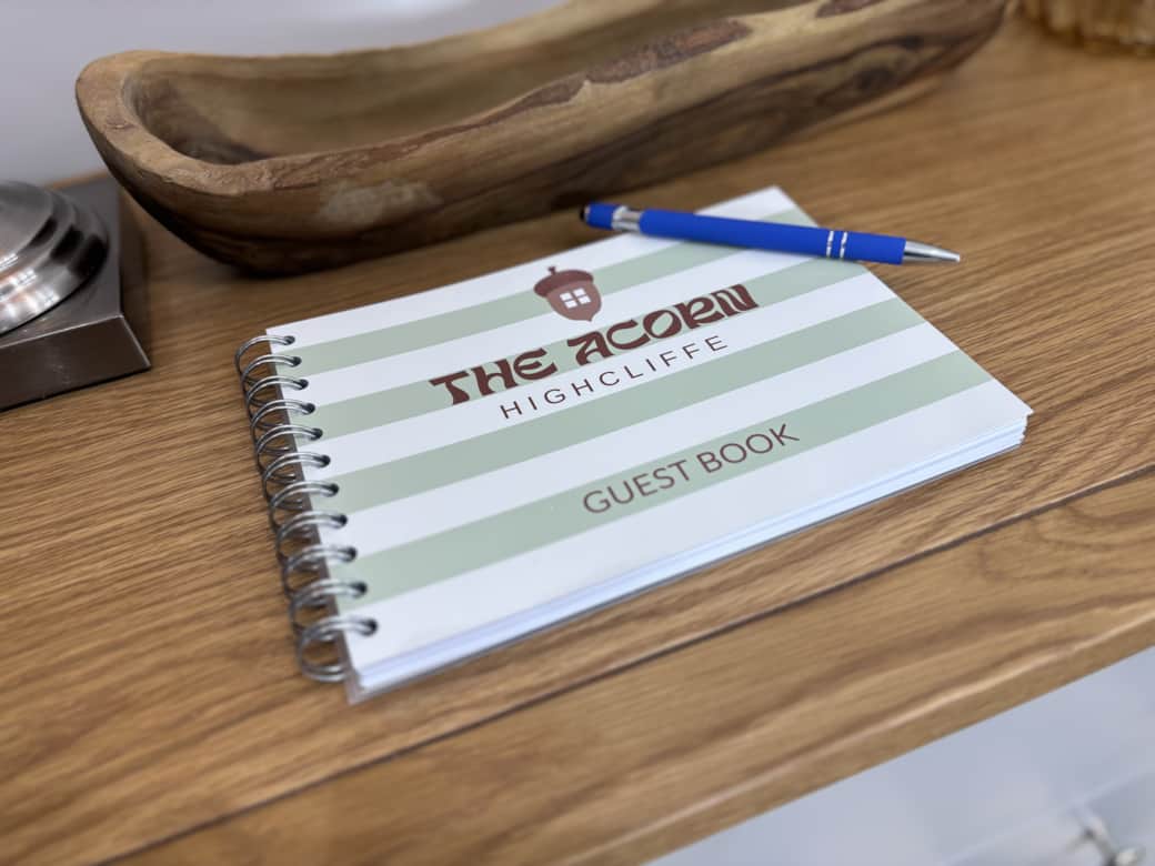 The acorn Highcliffe guest book