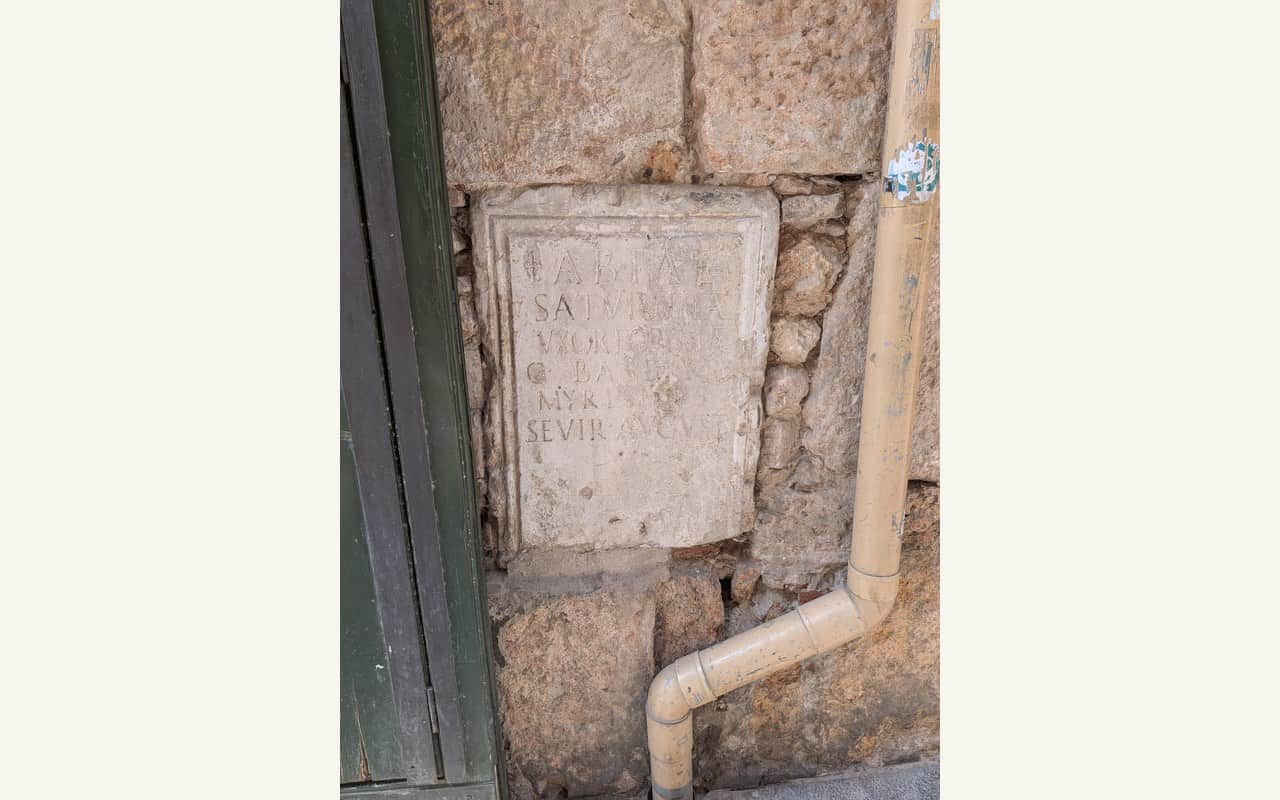 Roman inscribed stone reused in the façade of Casa Corderet in Tarragona