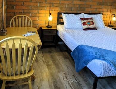 Owls Nest Interior includes A/C unit, refrigerator, microwave and electric fireplace.