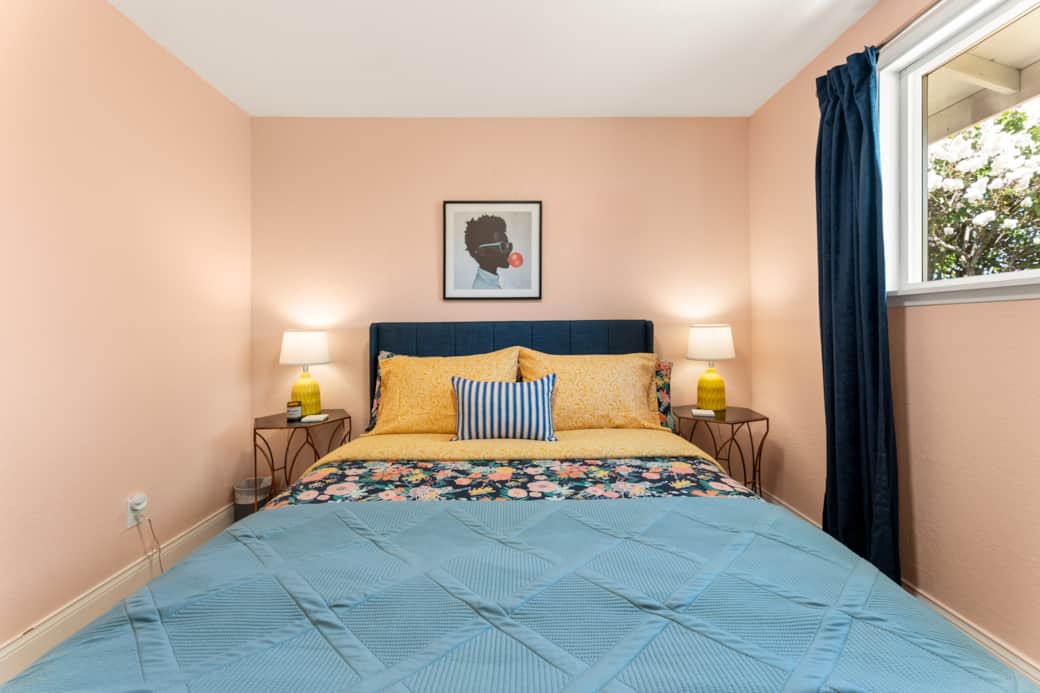Spacious bedroom with queen bed
