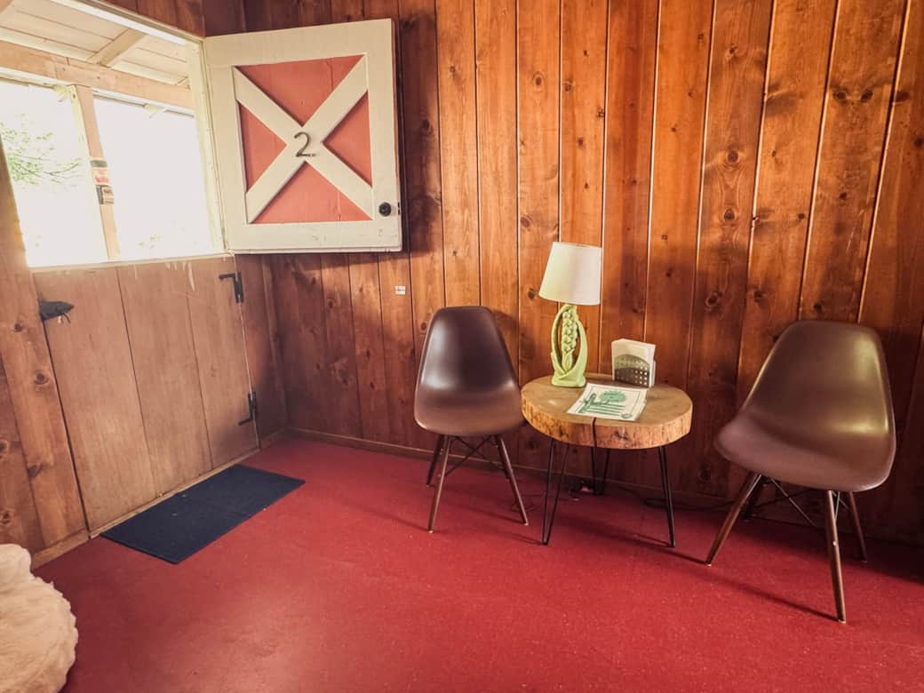 Seating area with open air view via Dutch door to outdoors.