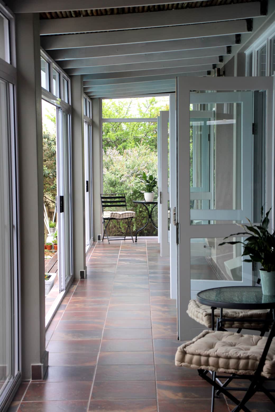 Patio coffee nook to overlook the pool, garden and fairway.