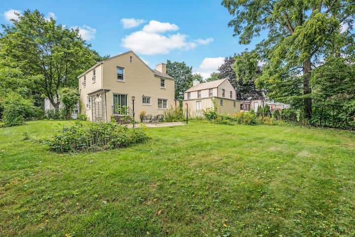 Charming home set on a spacious, tree-lined lot with a large backyard.
