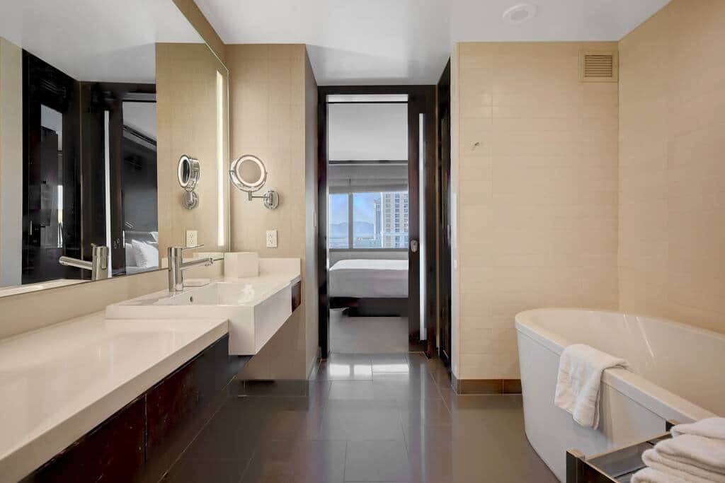 Spa-Inspired Bathroom with Dual Vanity and Soaking Tub Spa-Inspired Bathroom with Dual Vanity and Soaking Tub