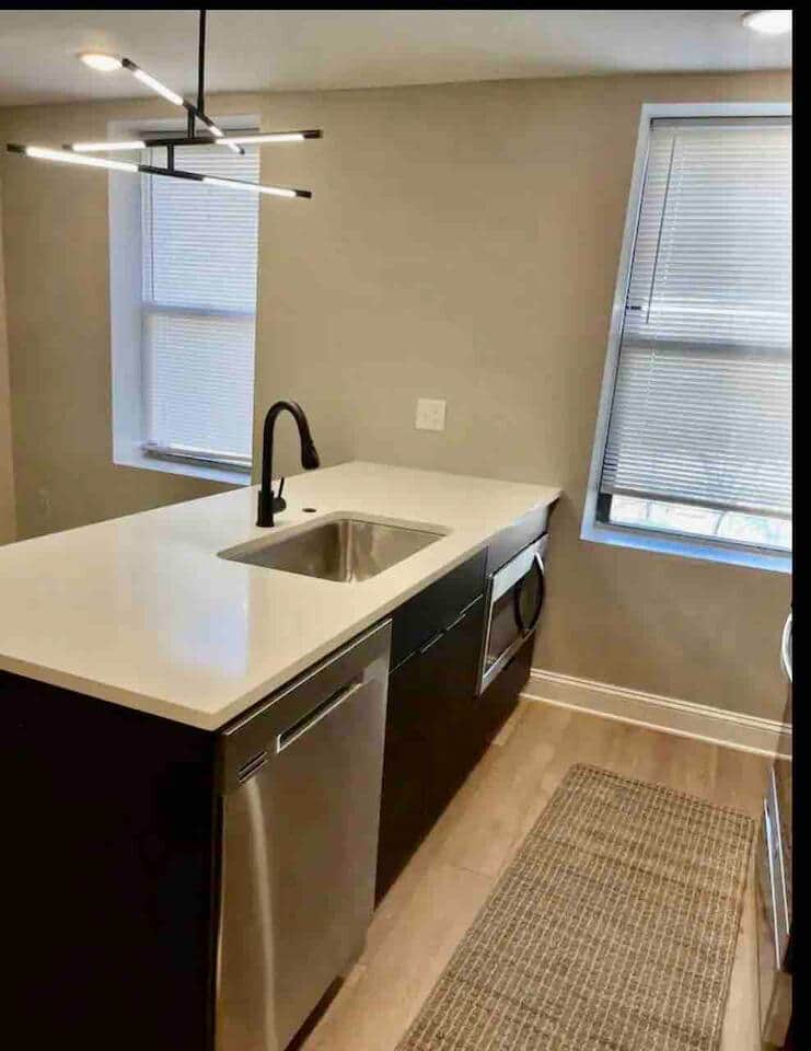 Check out our stunning, brand-new kitchen! It’s spacious and fully loaded with all the amenities you need, plus a breakfast bar and a dining table for meals and hangouts. Perfect for whipping up your favorite dishes or enjoying a nice meal!