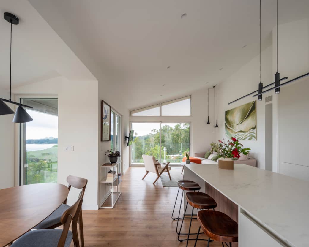 Bright open-plan living with stunning views, modern design, and a calm space to relax together.