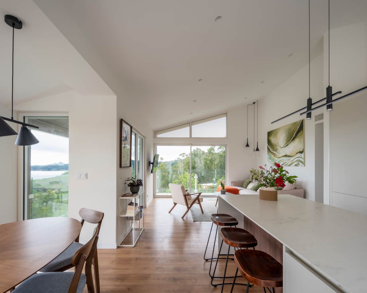 Bright open-plan living with stunning views, modern design, and a calm space to relax together.
