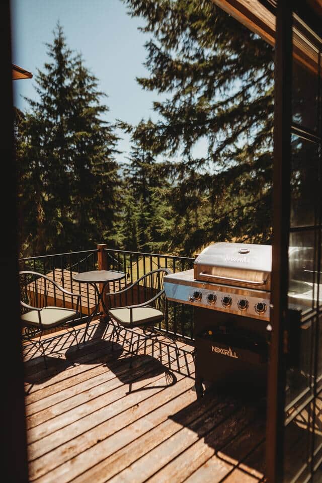 The deck off the dining area hosts a new grill with plenty of seating and great mountain views! The deck off the dining area hosts a new grill with plenty of seating and great mountain views!