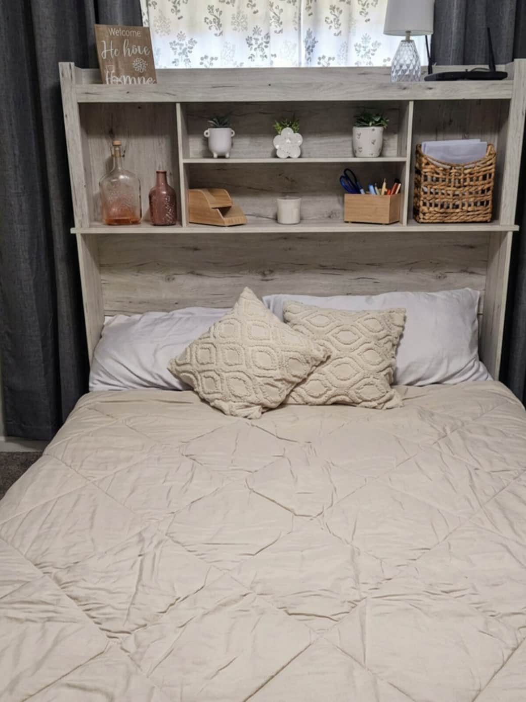 Desk folded out into queen sized bed. This is an open room, no door.
