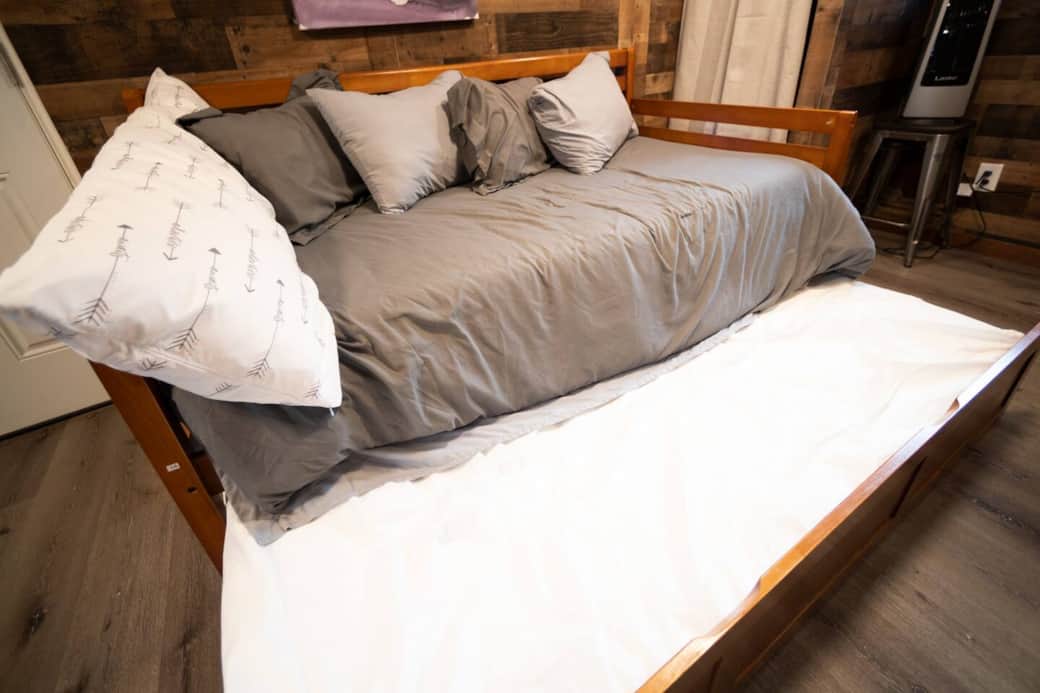 Day bed with second bed underneath. Both are high quality memory foam.
Day bed with second bed underneath. Both are high quality memory foam.