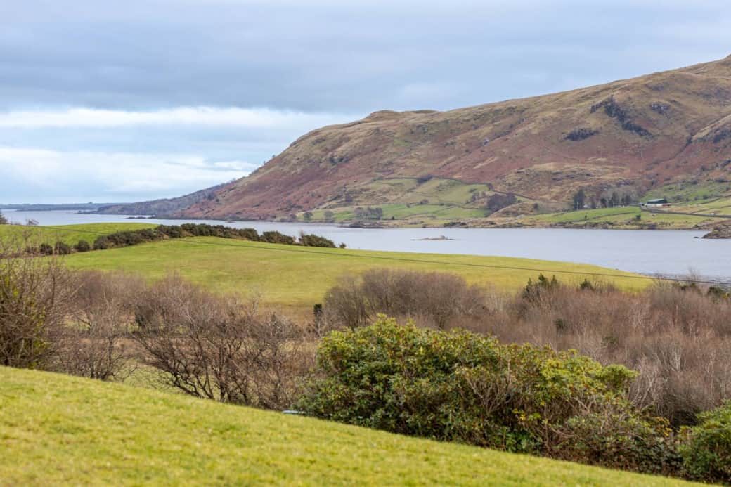 Panoramic lake and mountain views along Ireland’s Wild Atlantic Way. Panoramic lake and mountain views along Ireland’s Wild Atlantic Way.