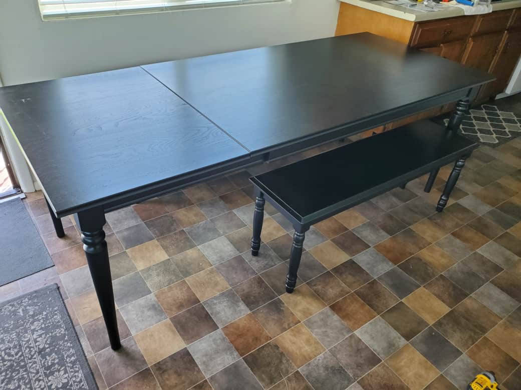 An extendable table (new in 2025) adds more table space and seating.