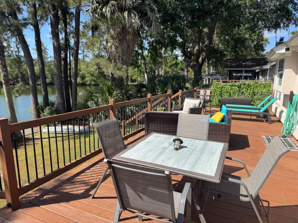 Spacious deck overlooking the water — ideal for morning coffee or evening drinks