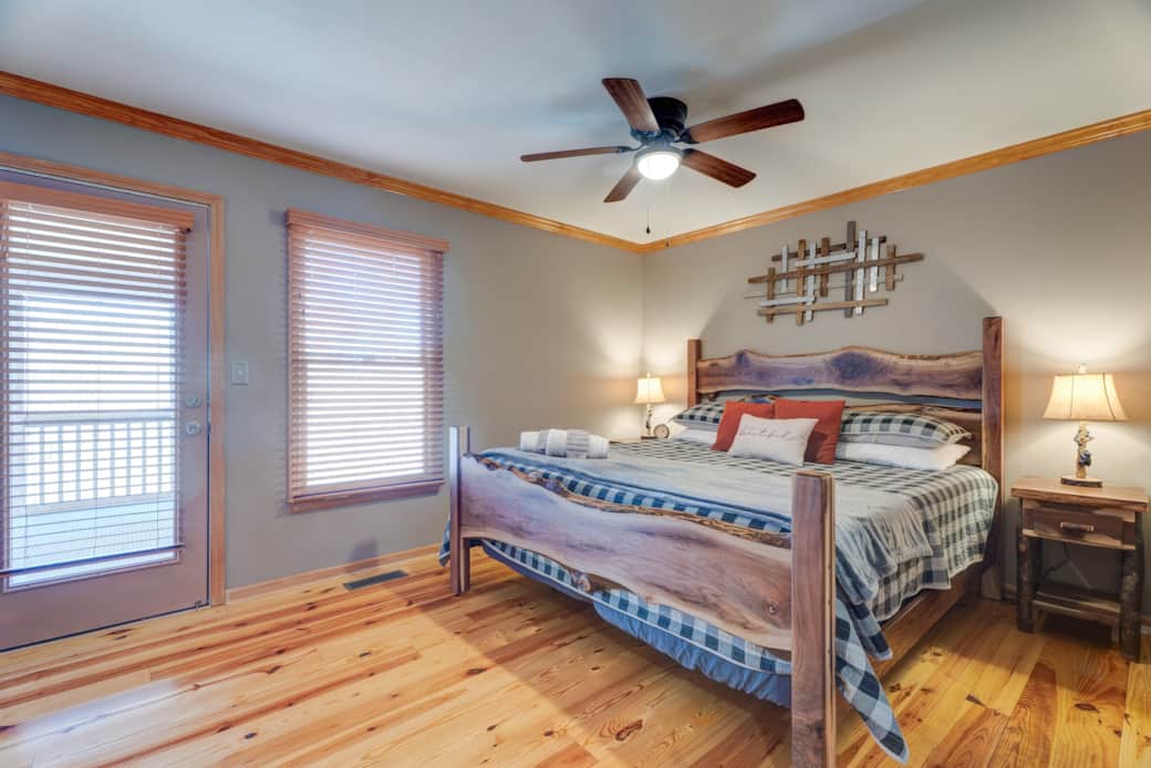 Peaceful primary bedroom with rustic charm.