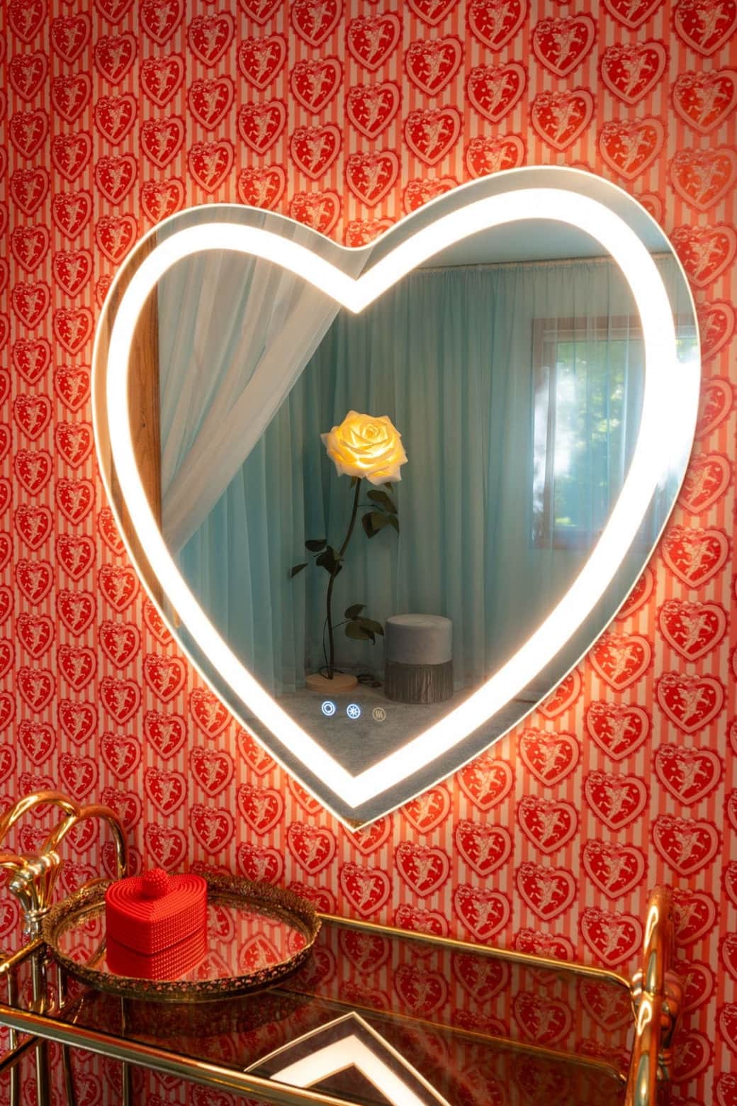 Light-up heart-shaped mirror with glowing rose lamp centerpiece Light-up heart-shaped mirror with glowing rose lamp centerpiece