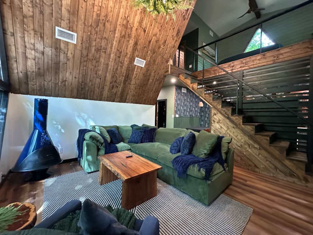 Sink into the velvet Joybird sofa and let the forest views wash over you