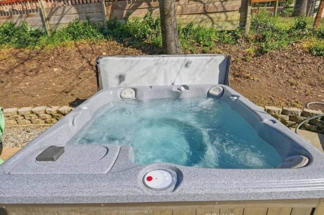 Private hot tub on the spacious outdoor deck