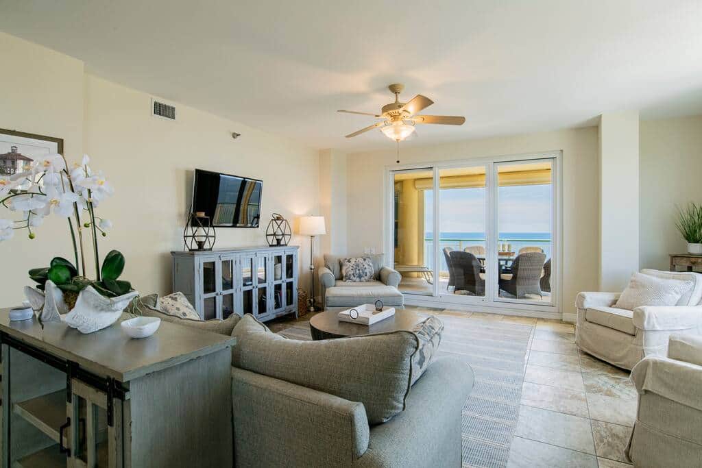 Den view opens to private balcony with seating for 6.  
