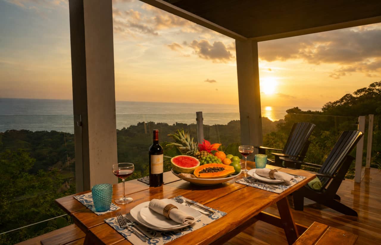 Sunset dining with tropical fruit, fine wine and sweeping views across the Pacific Ocean