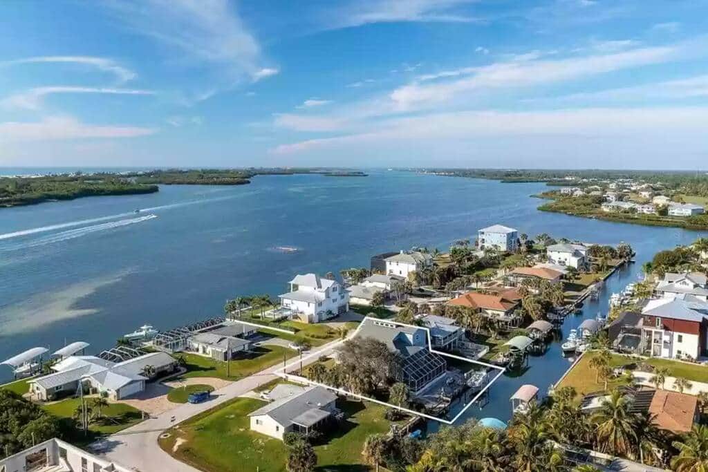 Dock your boat in a protected canal and have views over Lemon Bay