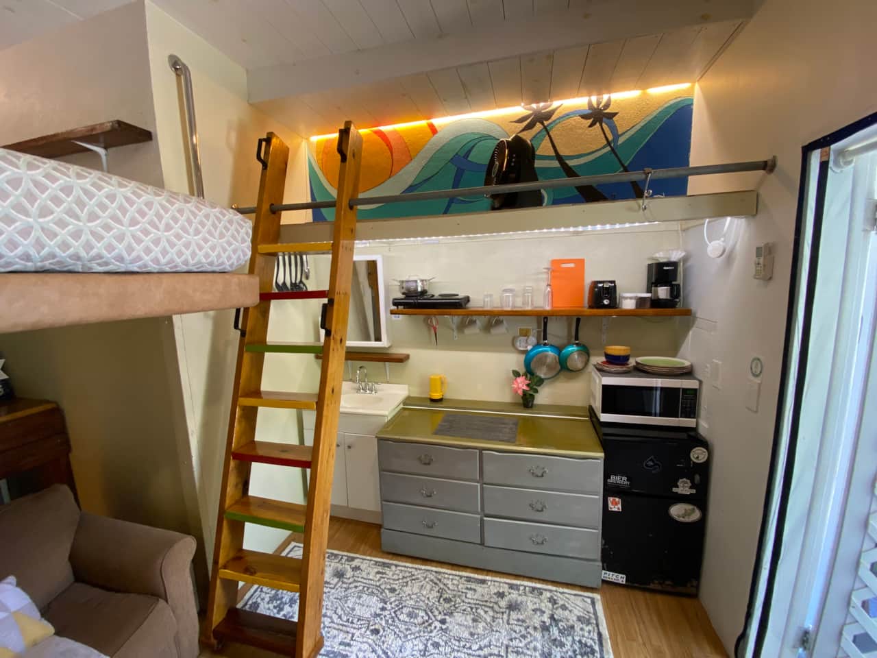 Kitchenette and ladder to loft