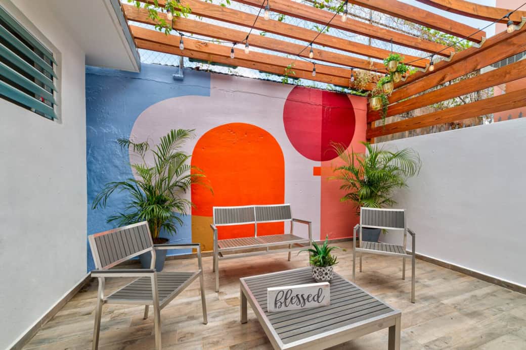 Enjoy an morning coffee or evening cocktail in the private veranda in the back of the house.