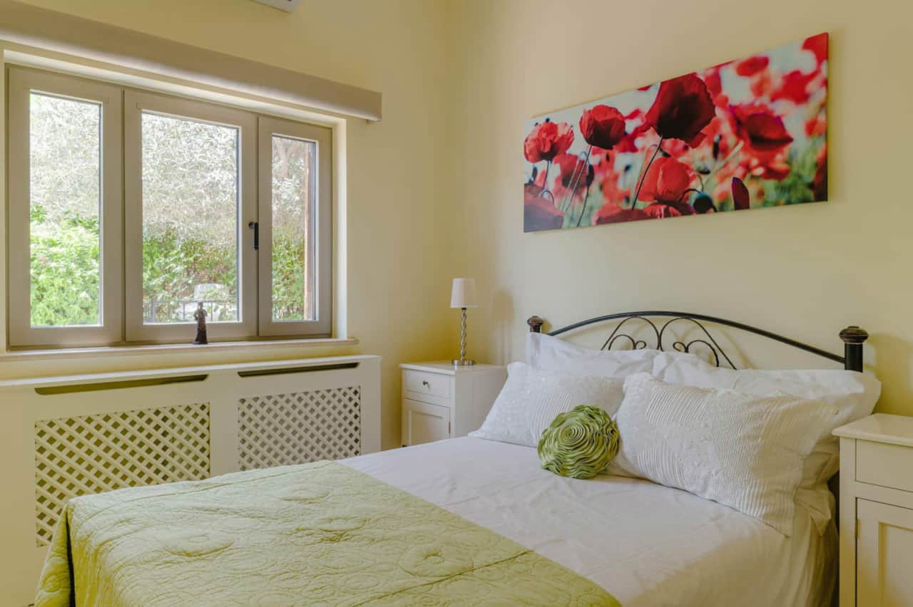 Double ground floor bedroom with wardrobes, walled tv and remote control blinds.