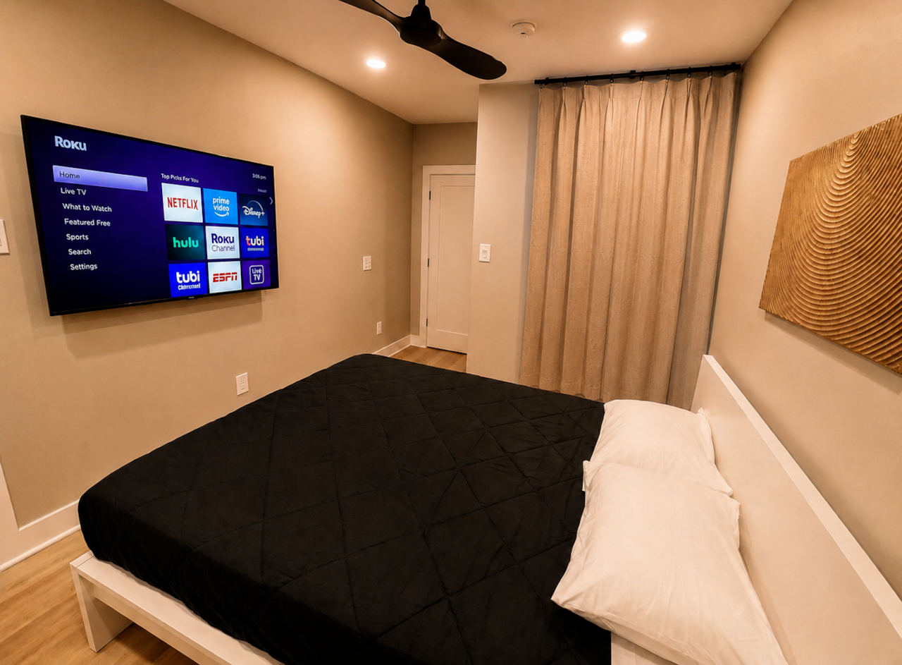 bedroom 3 with queen bed, large closet , and door to balcony