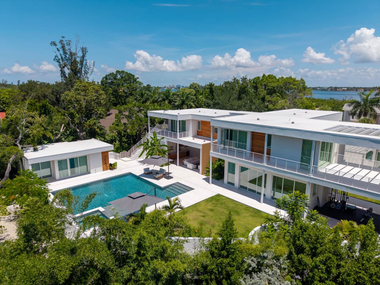 Casa tropicana birds eye view of the backyard with saltwater pool