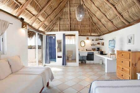 Fully equipped rooftop studio with traditional palm-thatched palapa roof. Fully equipped rooftop studio with traditional palm-thatched palapa roof.