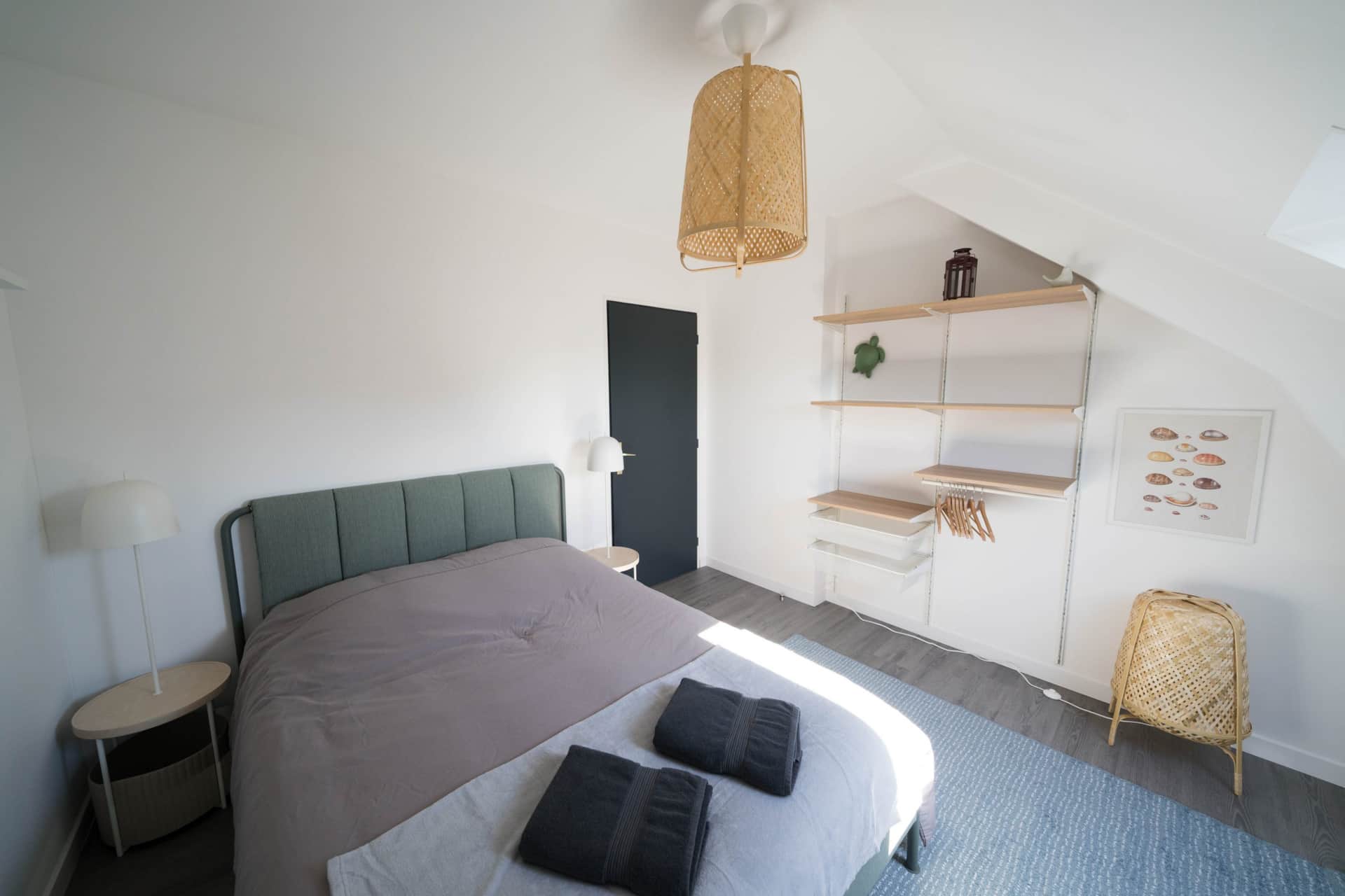 Literie haut de gamme dans une chambre d'un appartement AppartUnique à Vichy