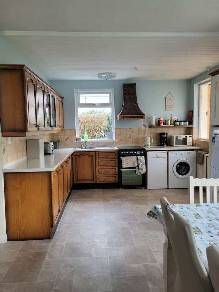 Very well equipped kitchen - double oven and 4 ring ceramic cooker, dishwasher, large fridge freezer, washing machine, tumble dryer, microwave, coffee machine, Kenwood chef etc.
Table and seating for 8