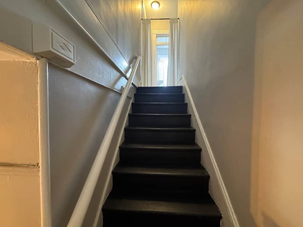 Entry to Unit B requires climbing approximately 18 stairs.