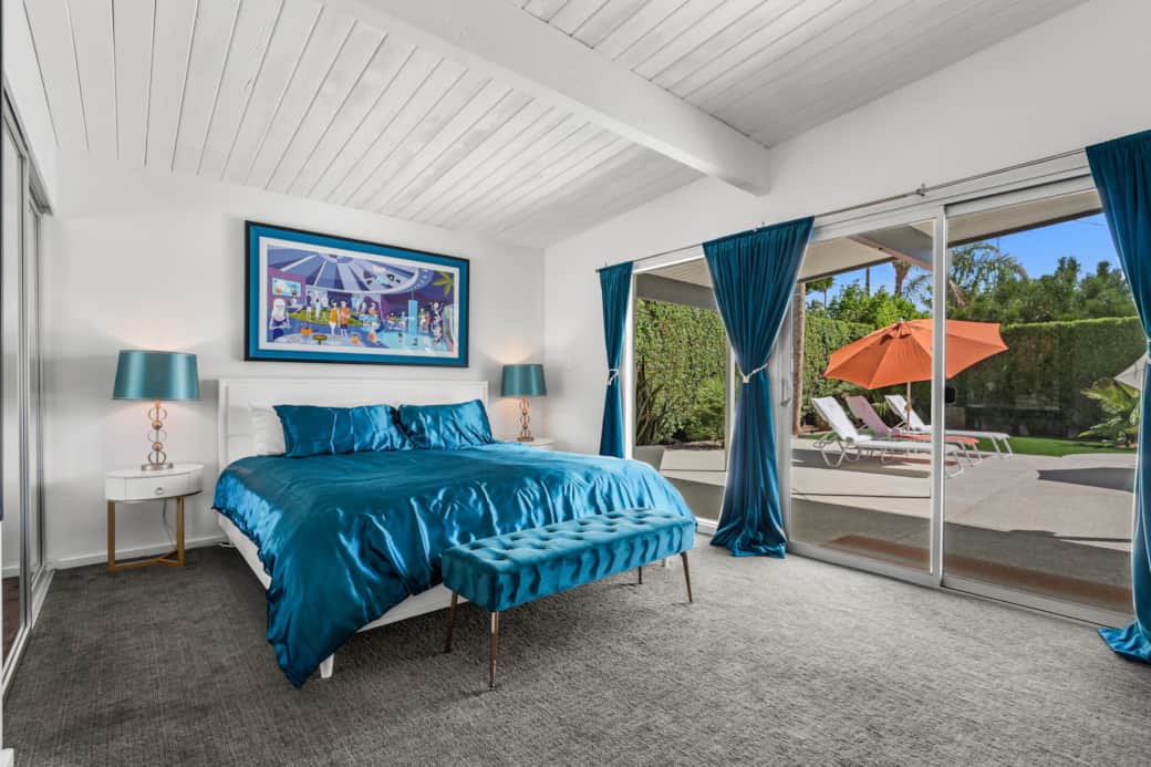 King bed, SHAG prints, en-suite, pool access — peak Palm Springs.