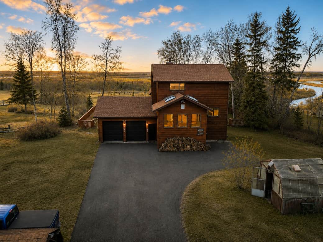 Front drive. You may enter through the garage door OR go to the right of the house and enter off the porch. 