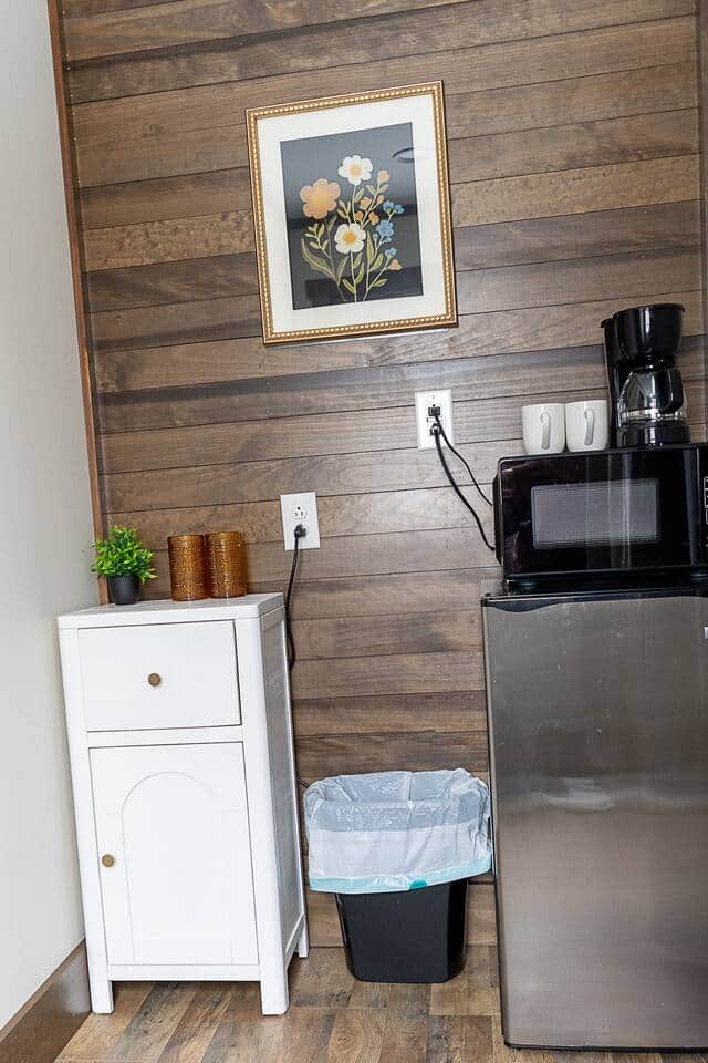 Mini fridge, microwave, coffee pot, cups 