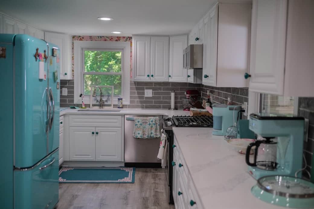 The kitchen is fully stocked with all necessary cooking ware and utensils. 