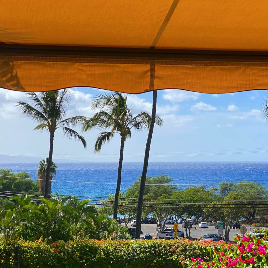 Enjoy the retractable awning for shade on lanai of Maui Kamaole G105