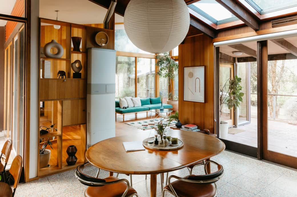 Looking from the lounge into the dining area and sun room Looking from the lounge into the dining area and sun room