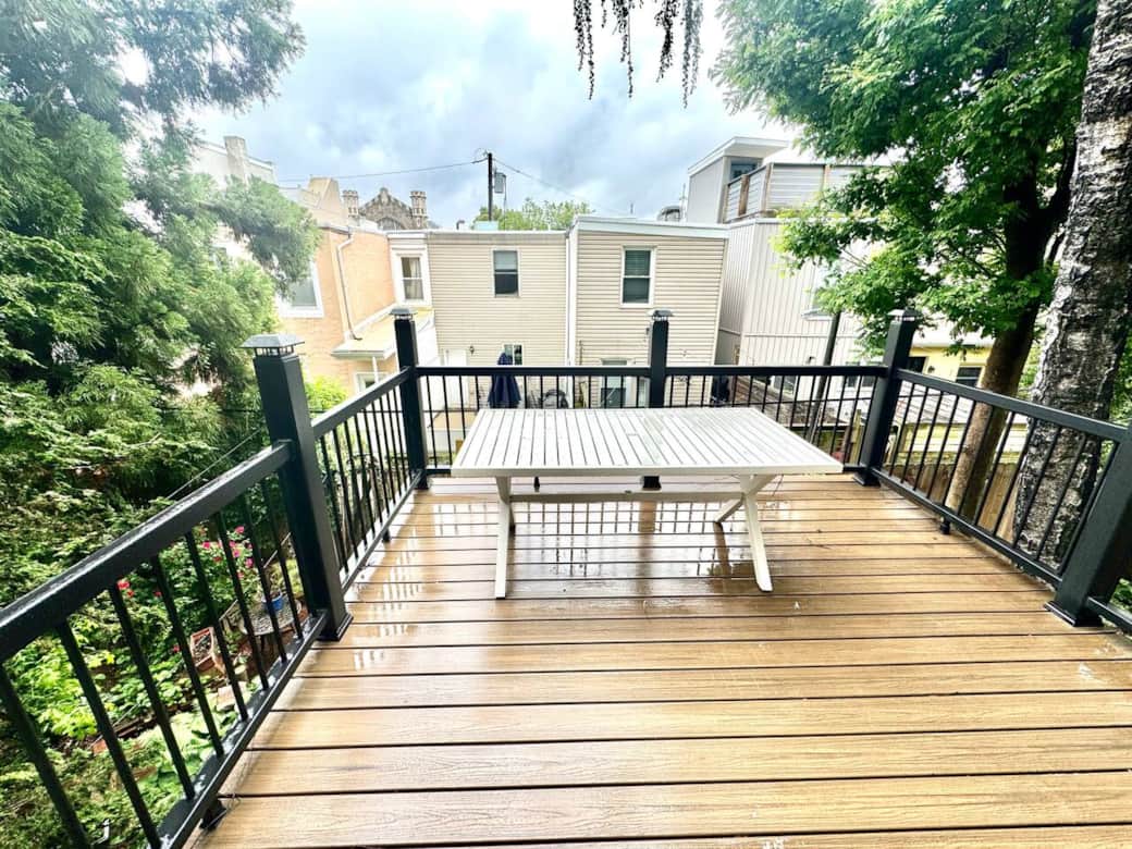 You can access a private deck from the living room, allowing you to step outside and enjoy a breath of fresh air.