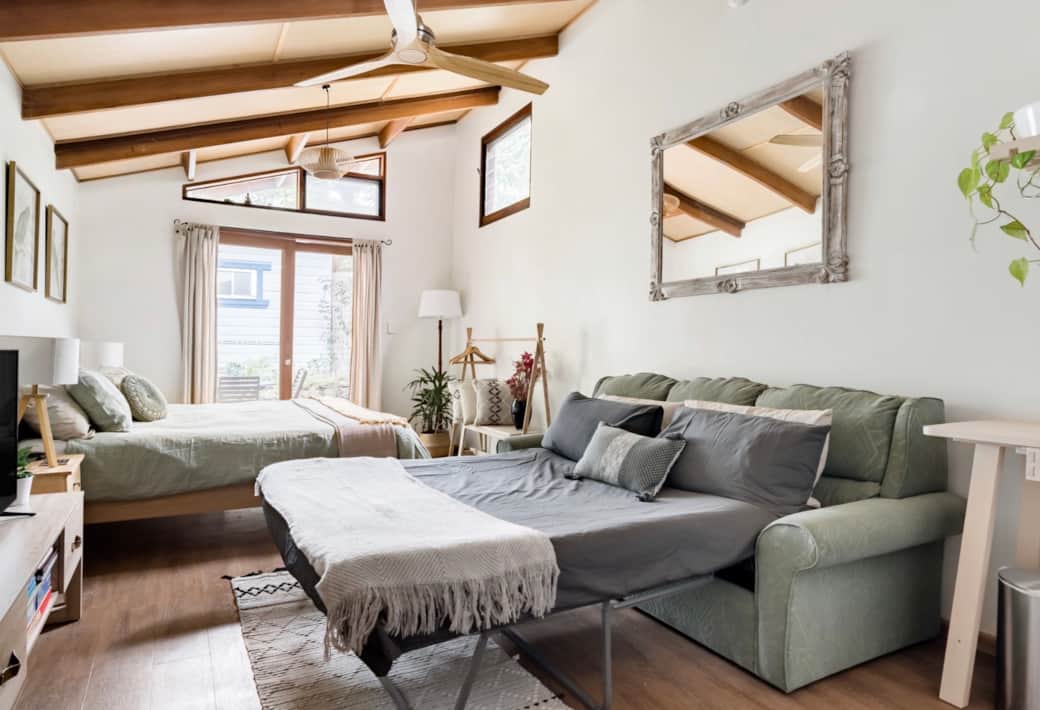 Sofabed folds out and away for extra space during the day