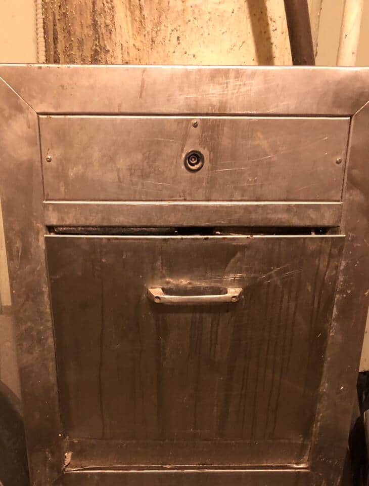 Garbage can on same floor opposite to studio 106