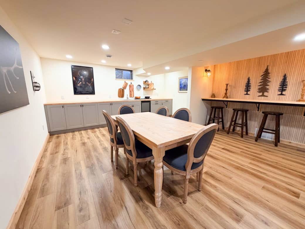 Lower level kitchenette, bar, dining space 