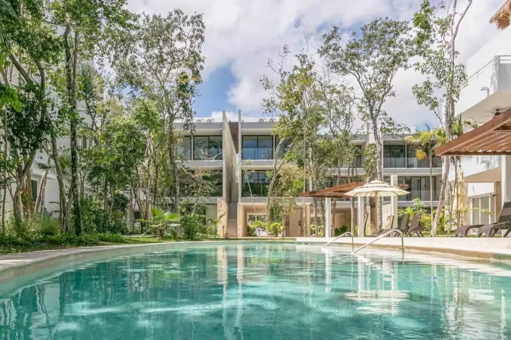 Indulge in luxury at our serene second pool, nestled in a tranquil oasis.