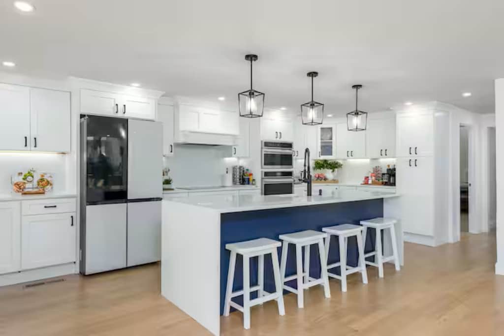 Every corner of this home exudes luxury built-in dry bar with wine fridge.