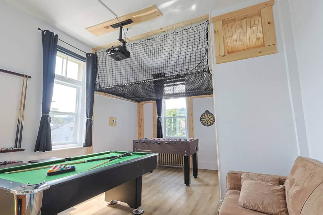 Huge games room with billiards, foosball, home theater, hammock net and more!
